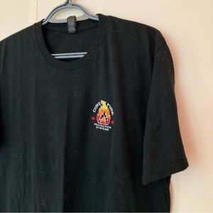Vintage black tri-blend short-sleeve tee with quality embroidered fire graphic
